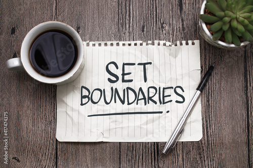 Set boundaries, text words typography written on paper against wooden background, life and business motivational inspirational photo