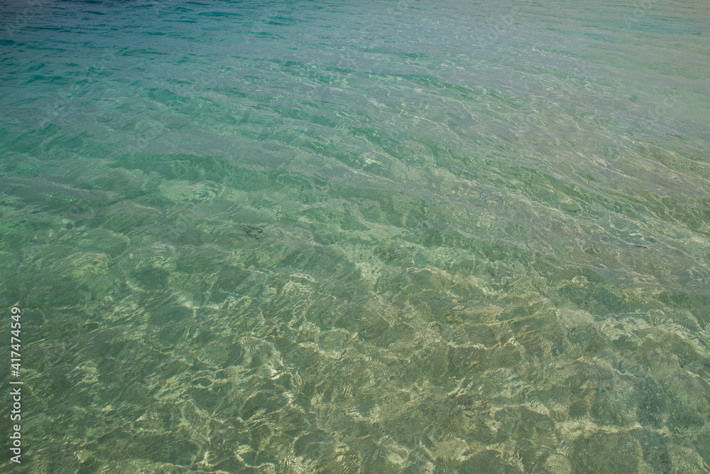 Clear water on a idyllic sandy beach Clear water on a idyllic sandy beach