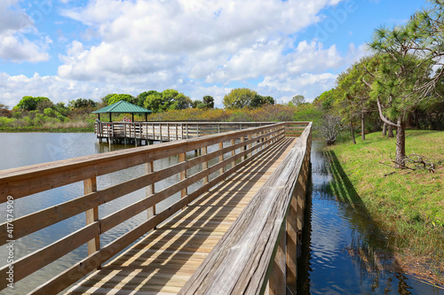 Scenic view of Wakodahatchee Wetlands Park, located in Delray Beach, Florida. The park was constructed on 50 acres of unused utility land and is now part of the Great Florida Birding Trail. photo