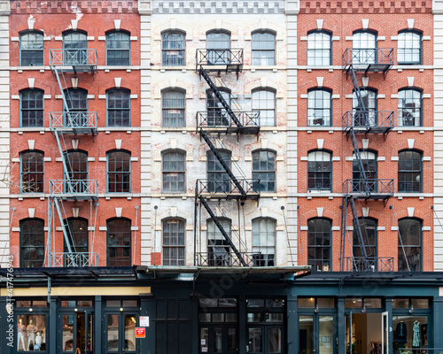 Exterior view of historic brick buildings along Duane Street in the Tribeca neighborhood of New York City