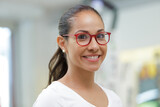 a female optician with glasses