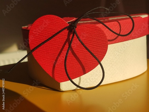 gift box and red heart shaped card