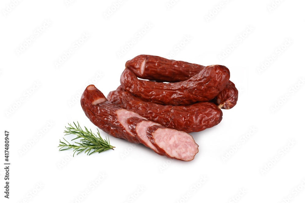 Rings of dry, smoked sausage, isolated on a white background. Traditional, Polish meat sausage.