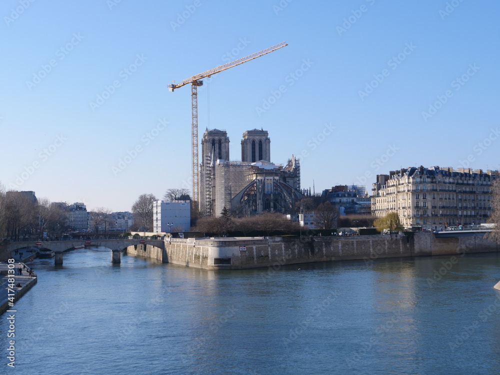 Notre Dame de Paris and its Yellow crane. 1st march 2021
