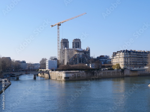 Notre Dame de Paris and its Yellow crane. 1st march 2021 © Yann Vernerie