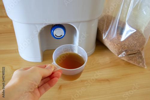 Bokashi tea harvested from compost bucket