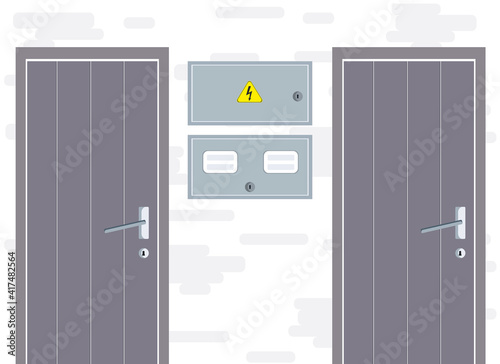 Doors of two apartments with an electricity meter