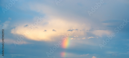 natural phenomenon - a beautiful rainbow in the sky after rain