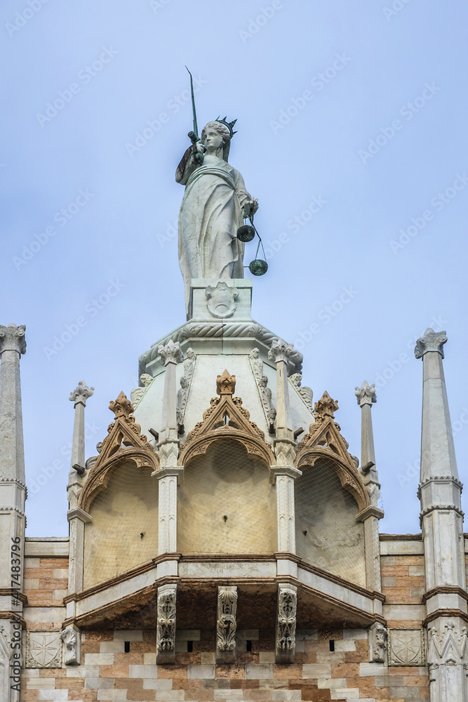 Architectural fragment of Doge Palace entrance (Palazzo Ducale, 1340) from St. Mark Square. Palace was the residence of the Doge of Venice. Veneto, Italy.