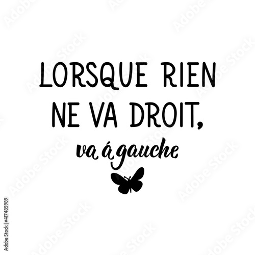 When nothing goes right, go left - in French language. Lettering. Ink illustration. Modern brush calligraphy.