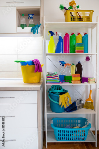 Cleaning supplies and tools in pantry photo