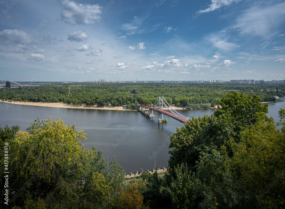 Aerial view of Dnieper River and Parkovy pedestrian bridge - Kiev, Ukraine
