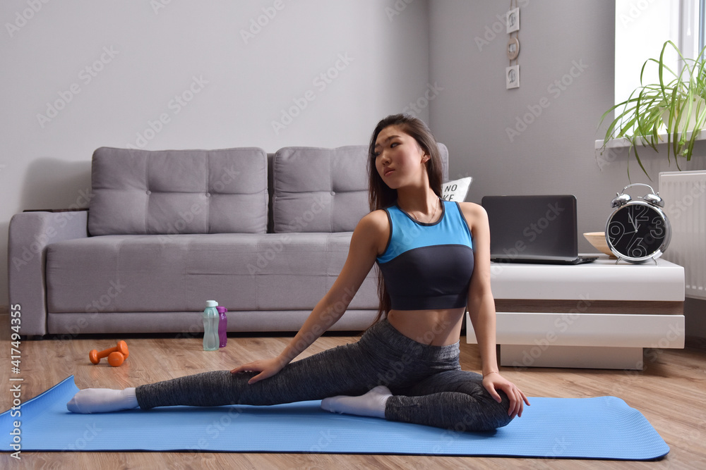 Young asian woman making online training yoga Young asian woman making online training yoga