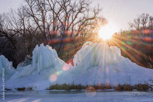Ice sculptures on Rush River, Wisconsin, at sunset time