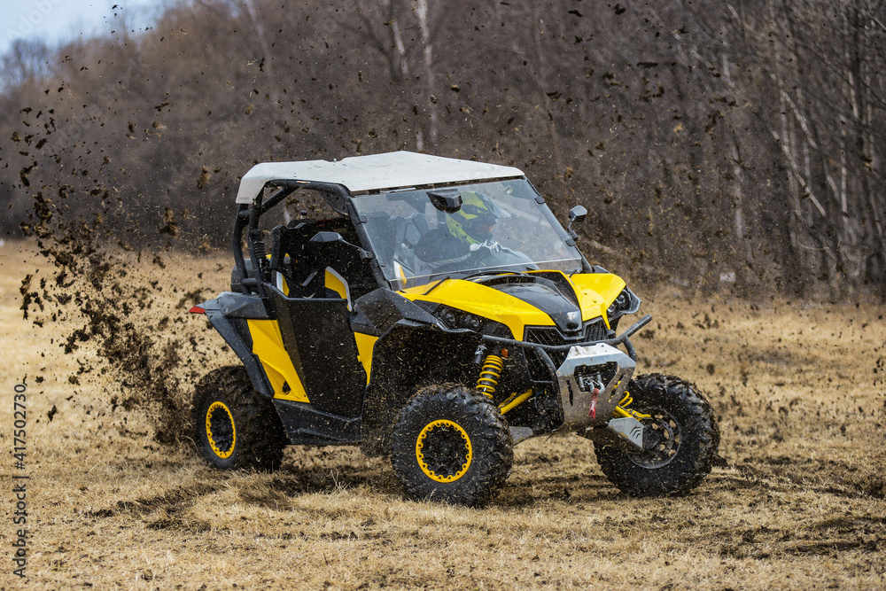 ATV adventure. Buggy extreme ride on dirt track. UTV ATV adventure. Buggy extreme ride on dirt track. UTV