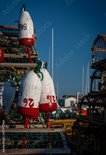 red and white fishing buoys 