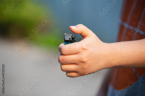 Close up hand with lighter