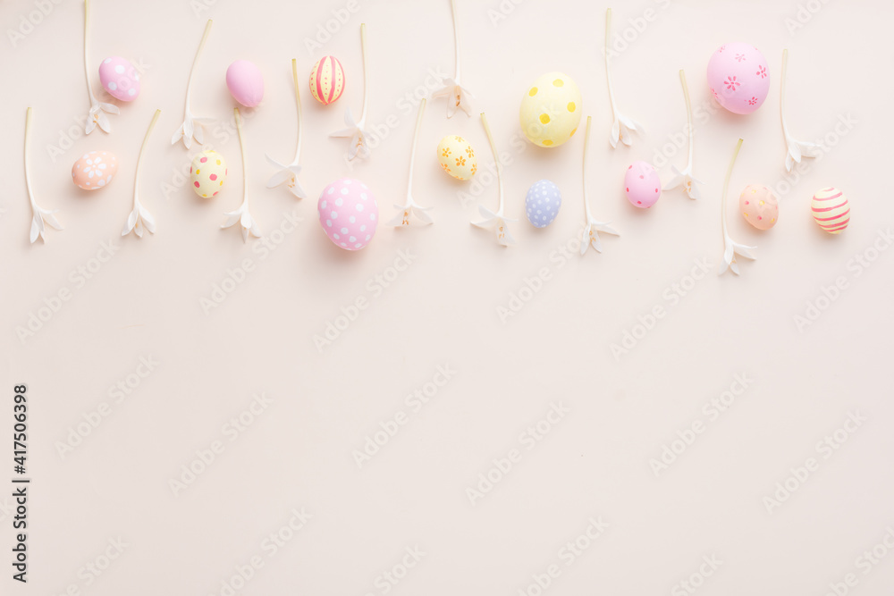 Happy Easter day eggs and flower on paper background with copy space