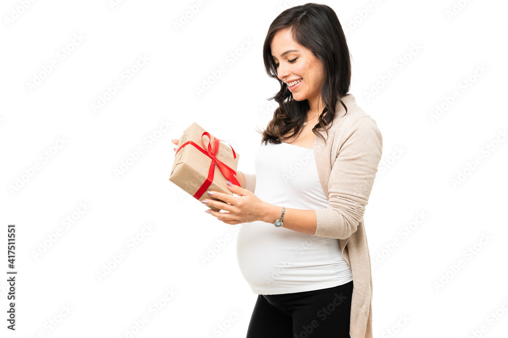 Smiling pregnant woman got a baby shower gift Smiling pregnant woman got a baby shower gift