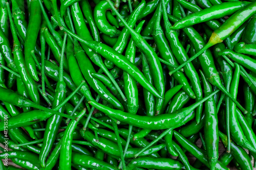 Bild auf Leinwand green hot chilli peppers pattern texture background