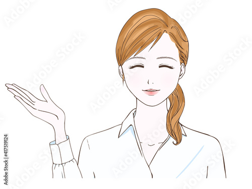 白シャツの女性_案内_笑顔