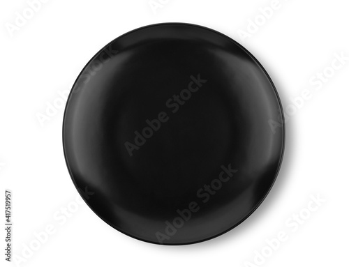 Black plate isolated on white background. Top view
