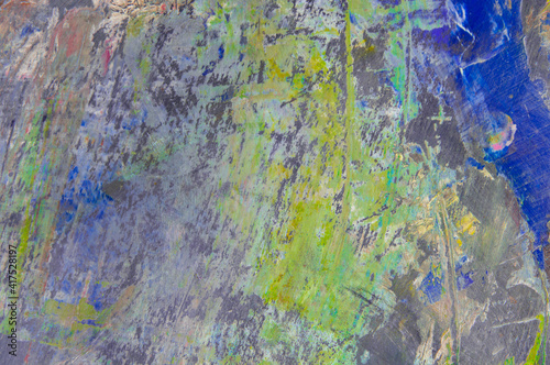 Wallpaper Mural colorful creative motley background: smudged residues of oil paints on a wooden palette, short focus, selective blur Torontodigital.ca