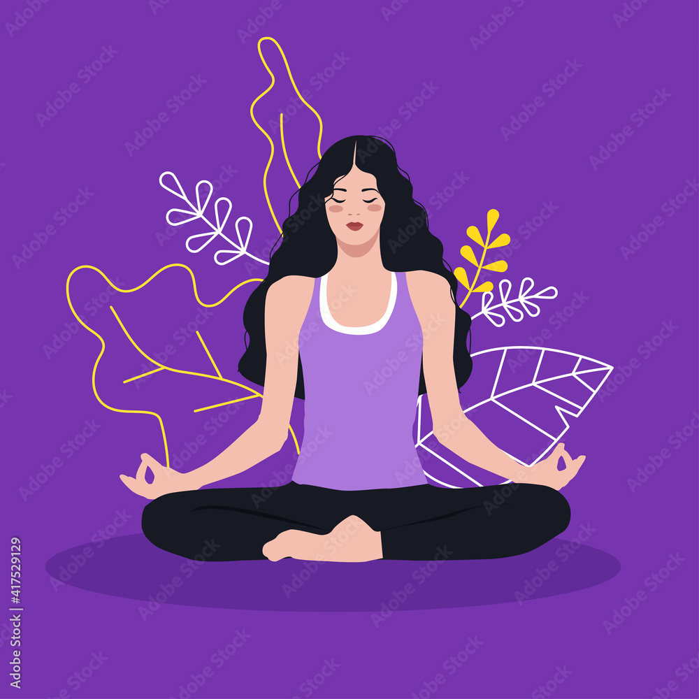 The girl is sitting in a meditation pose The girl is sitting in a meditation pose