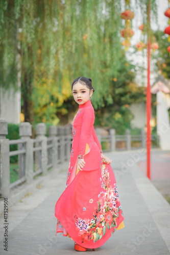 Vietnam beautiful girl wearing traditional Ao Dai © songphon
