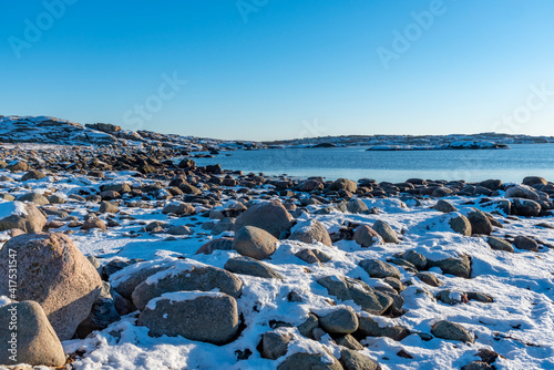 Snow at the beach in winter photo