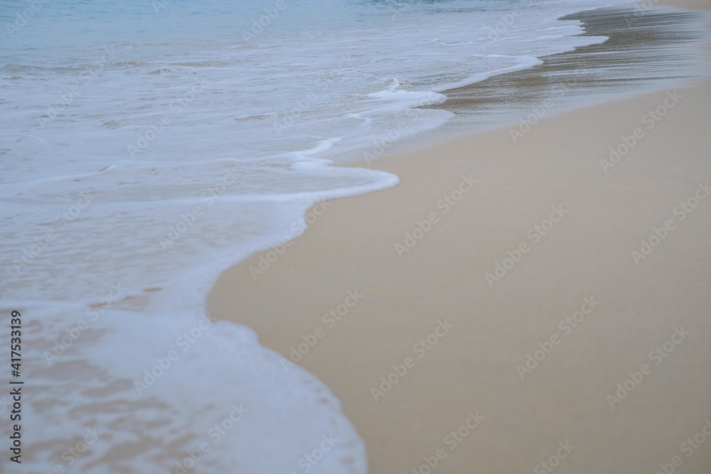 Soft wave on beach. Selective focus. wallpaper and background texture.