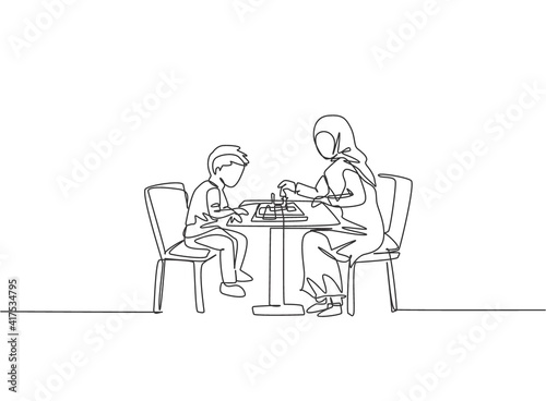 One single line drawing of young Arabian mother teach her son to play chess seriously at home vector illustration. Happy Islamic muslim family parenting concept. Modern continuous line draw design