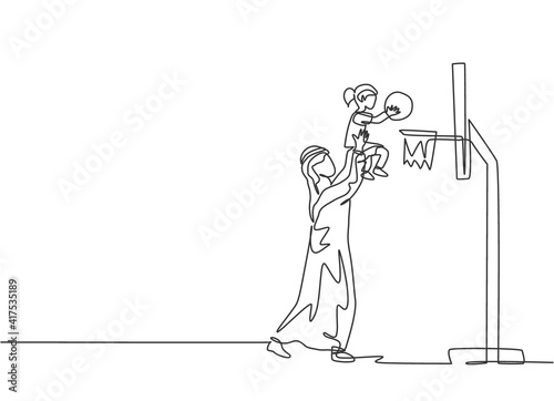 Single continuous line drawing of young Islamic help lifting her daughter to put a ball in basket hoop . Arabian muslim happy family fatherhood concept. Trendy one line draw design vector illustration