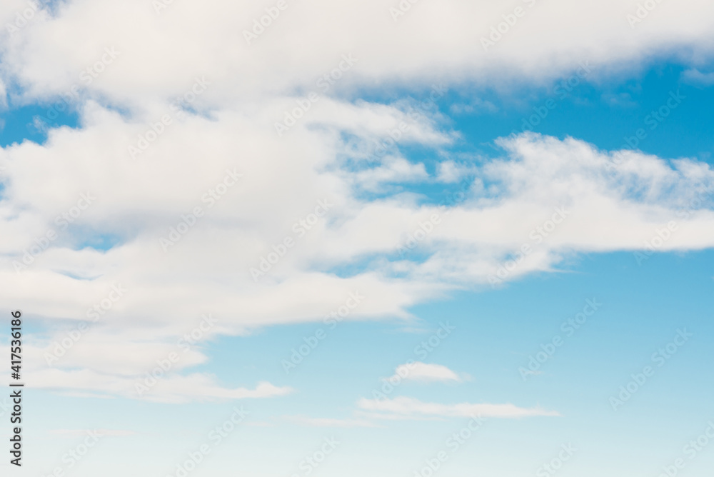 Fototapeta premium White clouds in blue sky.Winter clouds blue heaven background.