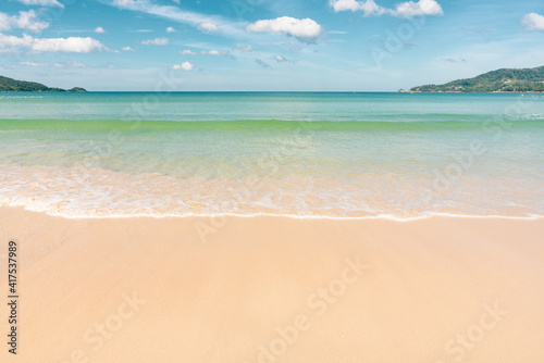 Fototapeta Naklejka Na Ścianę i Meble -  wave sea beautiful beach with white sand and blue sky, mountain. Seascape at Phuket Thailand