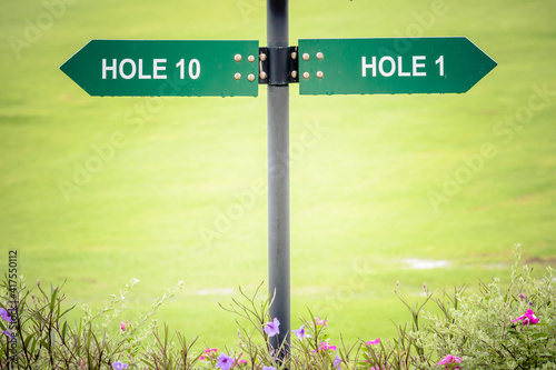 Signs for the tee off at the golf course, hole 1 and hole 10