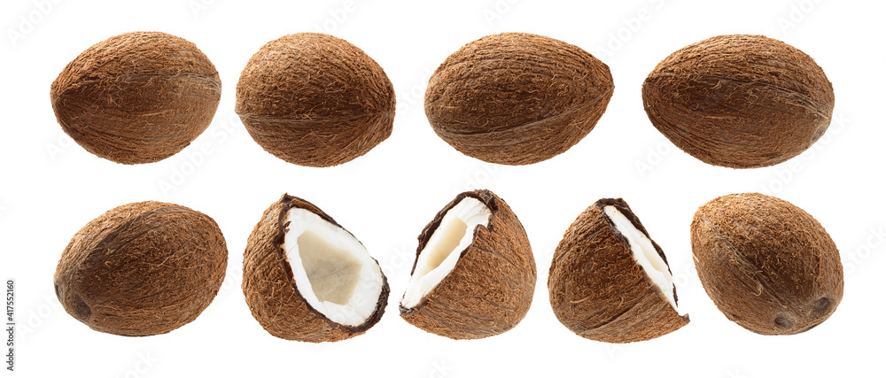 A set of Whole and half cocoanuts. Isolated on a white background A set of Whole and half cocoanuts. Isolated on a white background