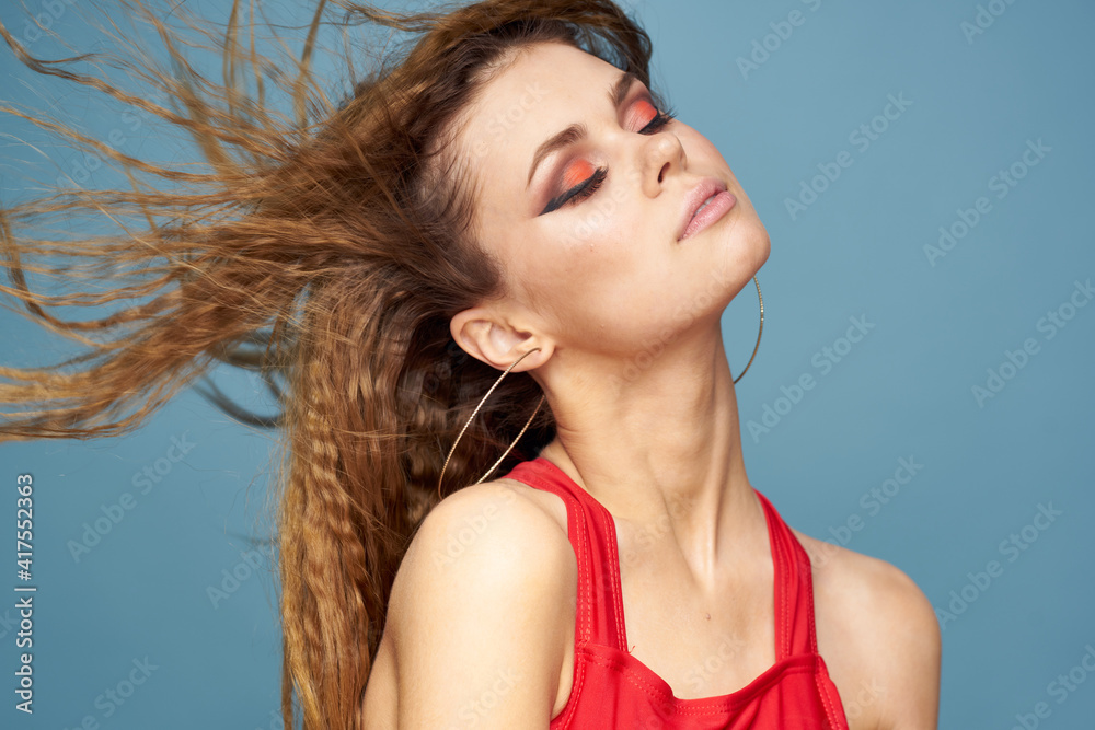 pretty woman red tank top bright makeup luxury blue background pretty woman red tank top bright makeup luxury blue background