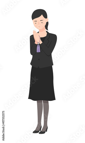 喪服の女性。手を合わせて合掌してる女性のイラスト。