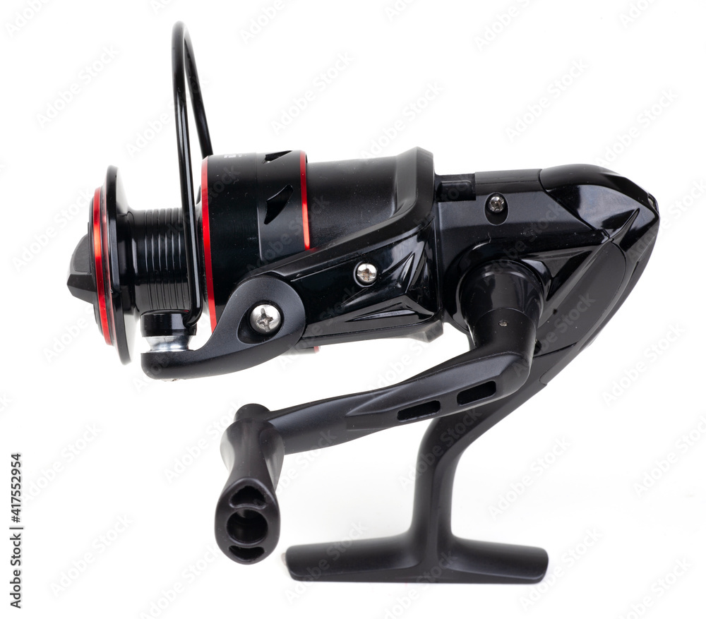 black fishing reel on the white black fishing reel on the white