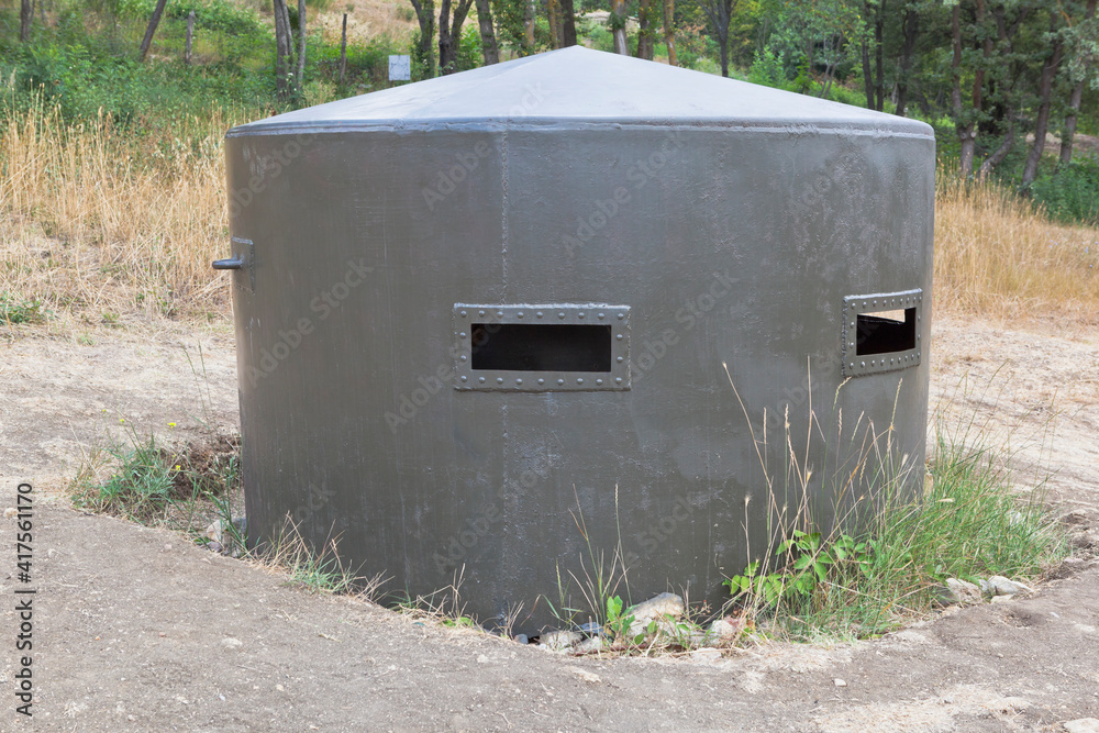 Fototapeta premium Metal bunker in the exposition of defensive fortifications and captured artillery of German troops on Sapun Mountain in the hero city of Sevastopol, Crimea