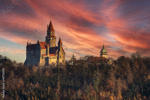 Romantic castle Bouzov in autumn at sunset