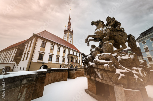 Caesar Fountain and Town Hall Clock Tower in Olomouc in winter time