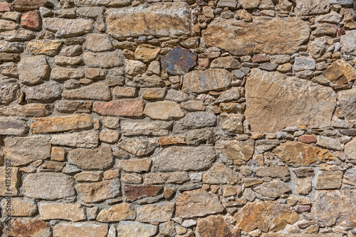 Architecture textures  detailed and rustic of paired masonry granite wall