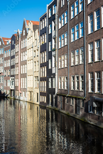 city canal houses in Amsterdam © Alena Petrachkova