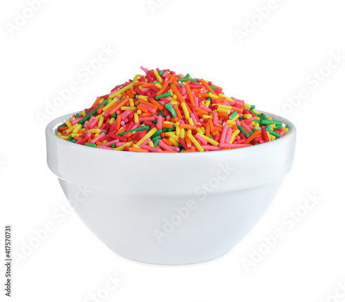 Colorful sprinkles in bowl on white background. Confectionery decor