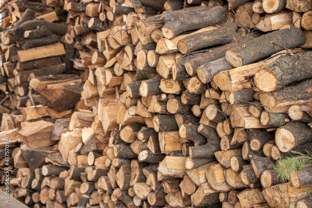 wall firewood, Background of dry chopped firewood logs in a pile wall firewood, Background of dry chopped firewood logs in a pile
