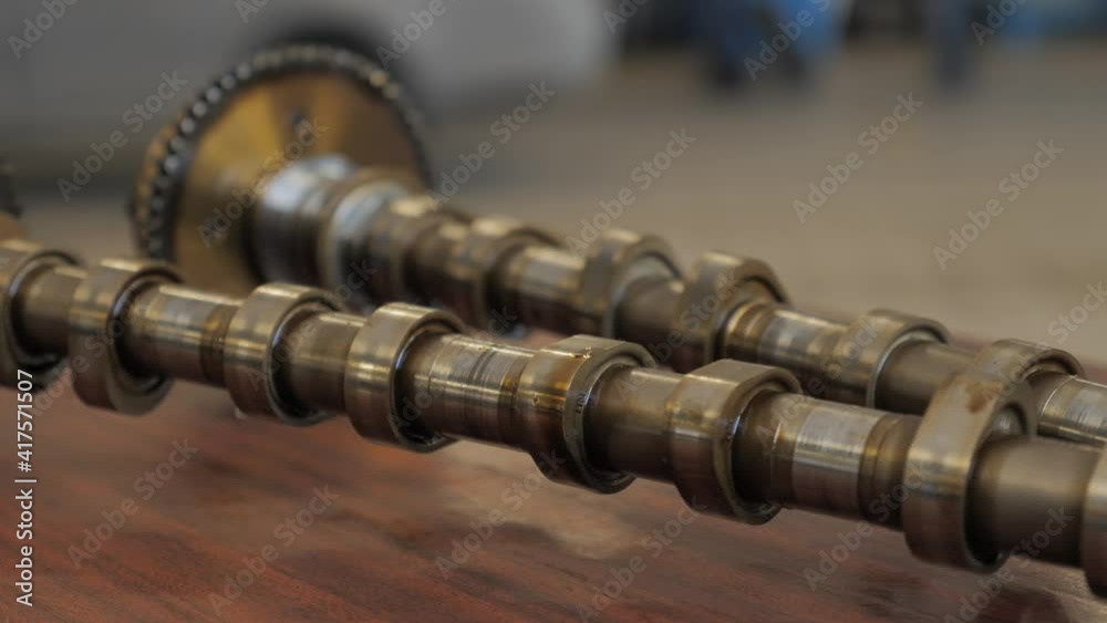 Used Camshaft Close-up. Motor Block Part of Car Used Camshaft Close-up. Motor Block Part of Car