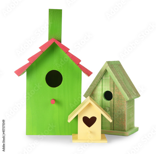 Three different bird houses on white background