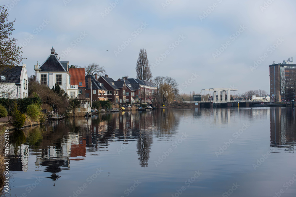 reflection of the city in the canal